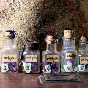 Amethyst in a vintage vial