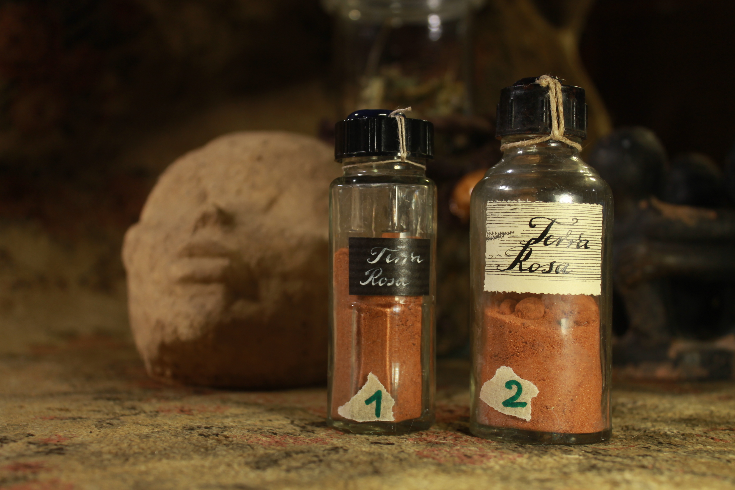 Terra rosa in antique bottles