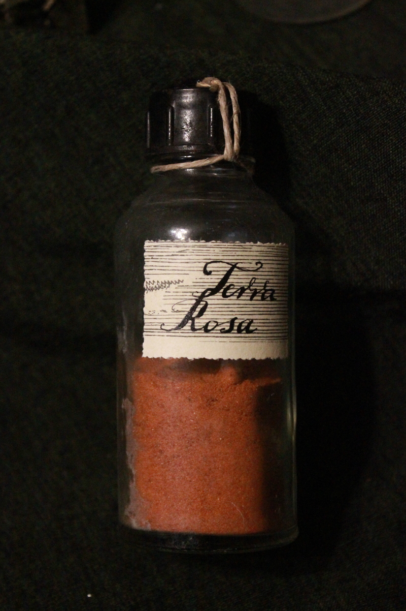 Terra rosa in an antique bottle