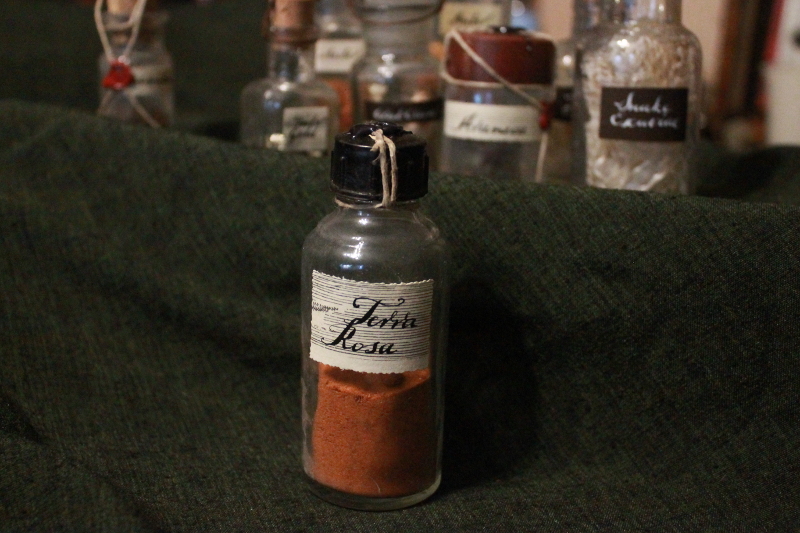 Terra rosa in an antique bottle