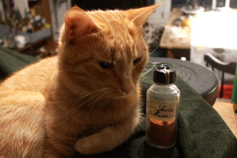 Terra rosa in an antique bottle