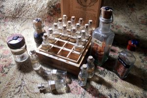 Set of 20 vintage bottles in a wooden case